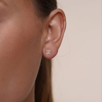 Beaded iridescent clover stud earrings in 14 karat gold, detail view