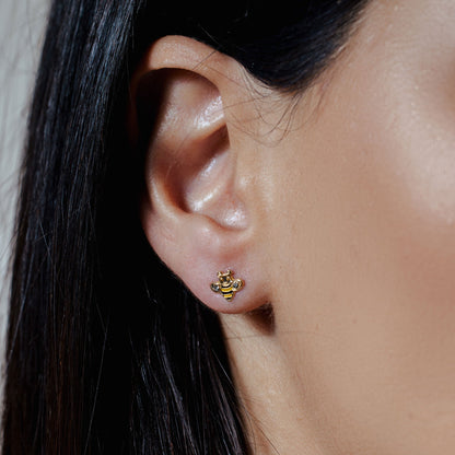 14K yellow gold bee stud earrings with black and yellow enamel and clear CZ